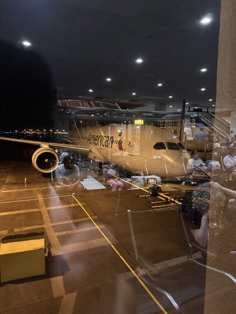 American Airlines Premium Economy Review: Honolulu (HNL) to Phoenix (PHX) on the Boeing 787-8 Hawaii Calling a plane in a hangar