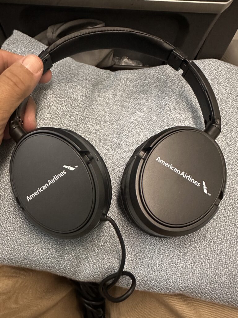 American Airlines Premium Economy Review: Honolulu (HNL) to Phoenix (PHX) on the Boeing 787-8 Hawaii Calling a pair of black headphones