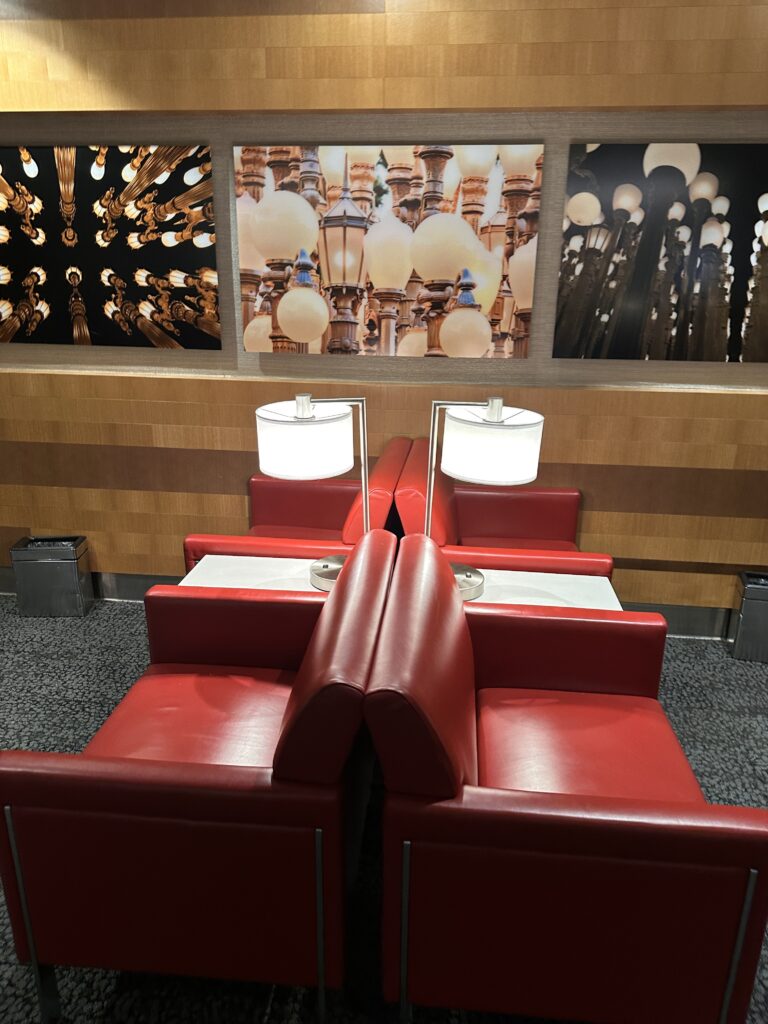 Review: American Airlines A321neo Los Angeles (LAX) - Honolulu (HNL) Economy Hawaii Calling a red booth seating in a restaurant