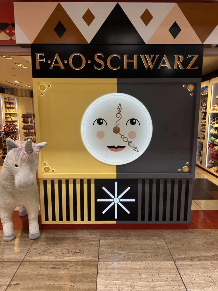 Review: American Airlines A321neo Los Angeles (LAX) - Honolulu (HNL) Economy Hawaii Calling a toy unicorn next to a sign