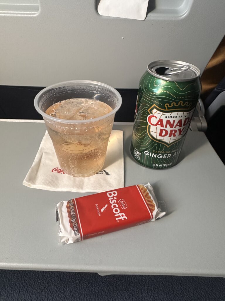 Review: American Airlines A321neo Los Angeles (LAX) - Honolulu (HNL) Economy Hawaii Calling a beverage can and a drink on a table