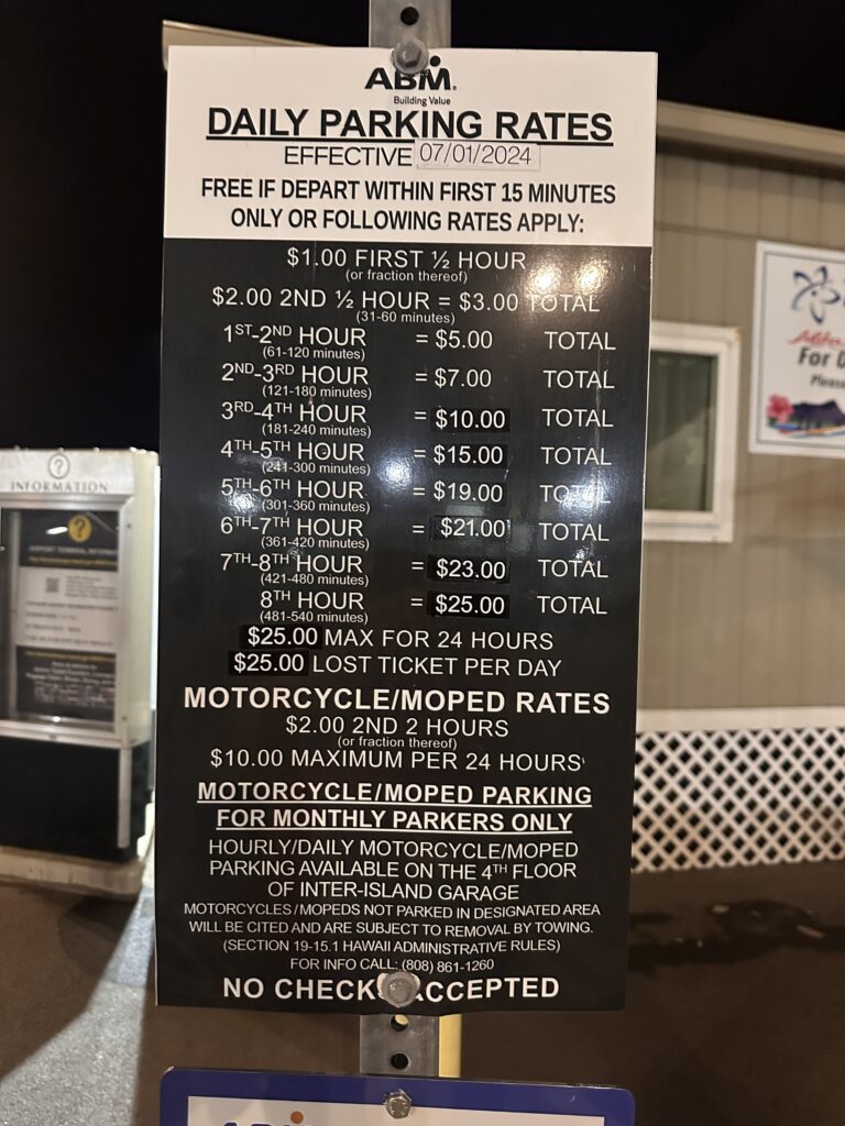 Mokulele Airlines Review: Honolulu (HNL) to Lāna‘i (LNY) | A Scenic Solo Flight Review Hawaii Calling a sign with a price list