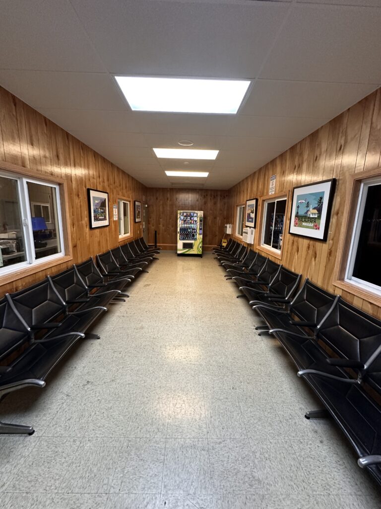 Mokulele Airlines Review: Honolulu (HNL) to Lāna‘i (LNY) | A Scenic Solo Flight Review Hawaii Calling a row of chairs in a hallway