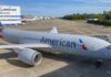 American Airlines Reintroduces Nonstop Chicago to Honolulu Service a large white airplane on a runway