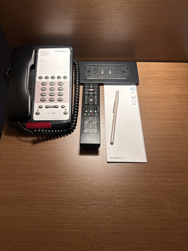 Residence Inn Oahu Kapolei: A Smart Option for Longer Stays on Oʻahu Hawaii Calling a telephone and remote control on a table