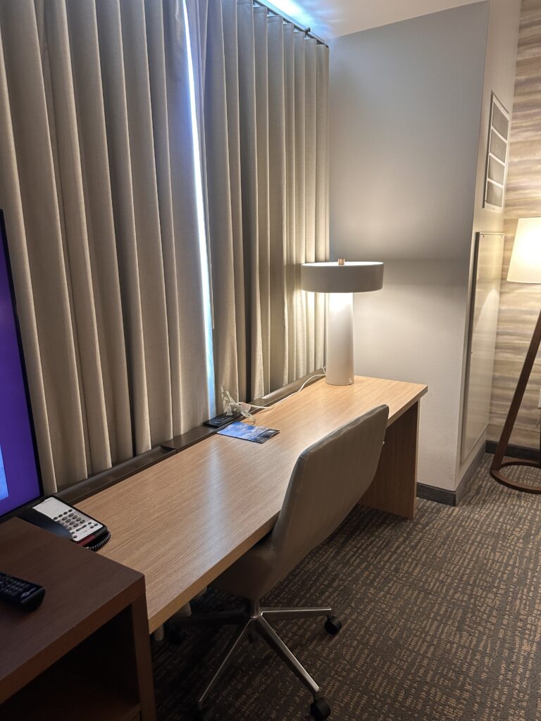 Residence Inn Oahu Kapolei: A Smart Option for Longer Stays on Oʻahu Hawaii Calling a desk with a lamp and a television in a room