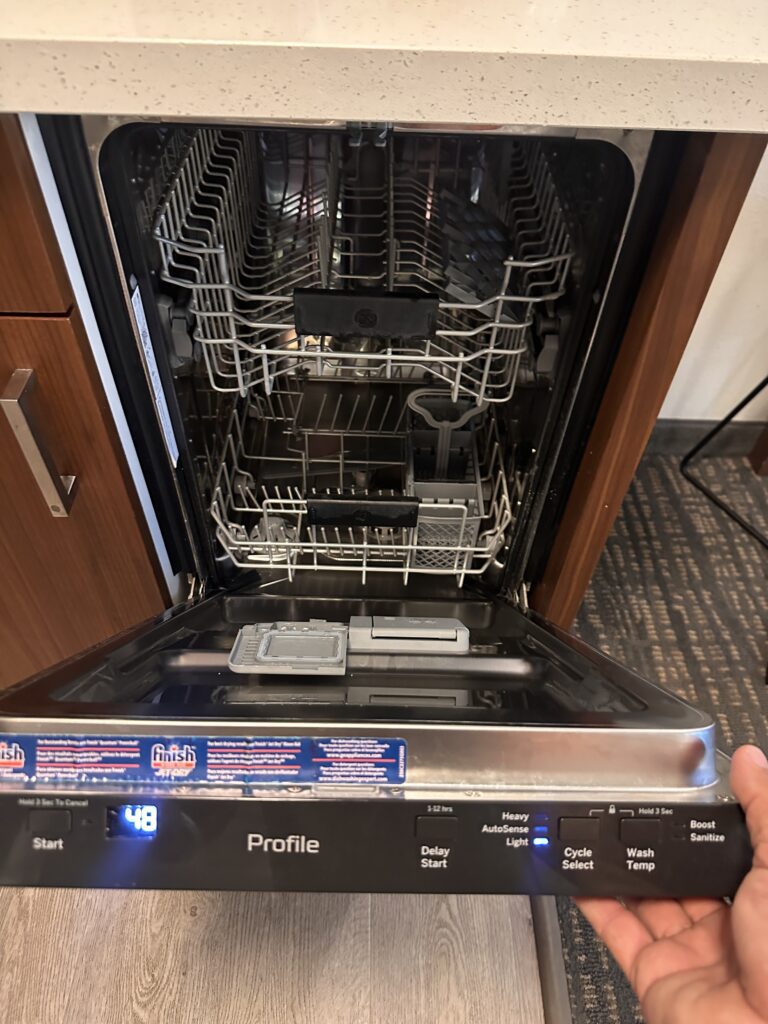 Residence Inn Oahu Kapolei: A Smart Option for Longer Stays on Oʻahu Hawaii Calling a dishwasher with a hand holding the open door