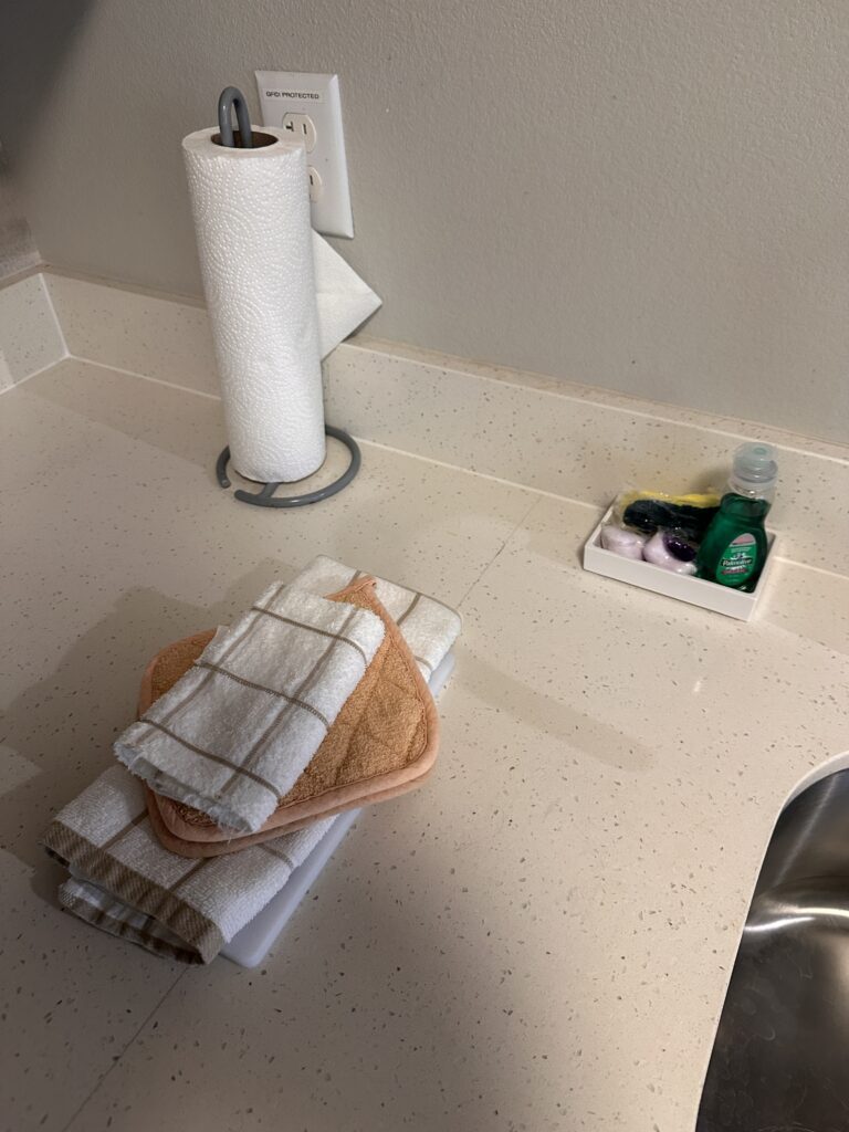 Residence Inn Oahu Kapolei: A Smart Option for Longer Stays on Oʻahu Hawaii Calling a roll of toilet paper and towels on a counter