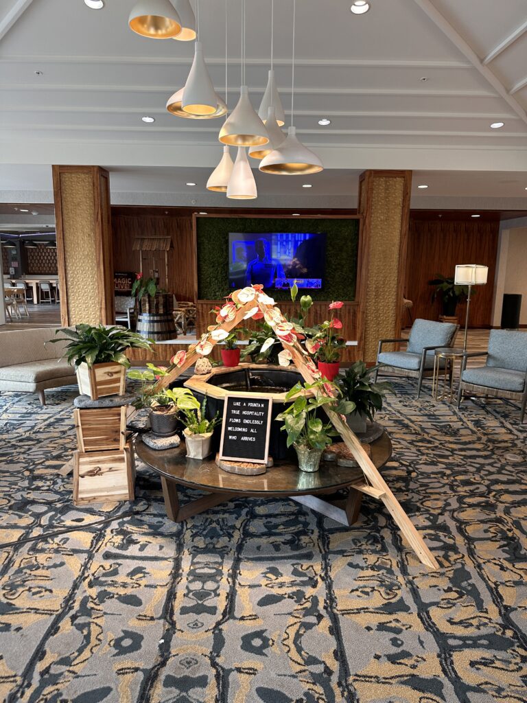 Residence Inn Oahu Kapolei: A Smart Option for Longer Stays on Oʻahu Hawaii Calling a room with a table with plants and a sign