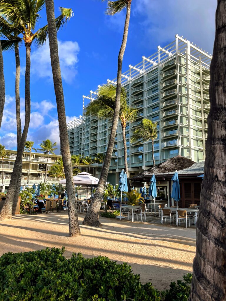 What Hotel Was The New Lilo & Stitch Movie Filmed? Inside the Iconic Kahala Hotel On Oahu Hawaii Calling a building with palm trees and umbrellas