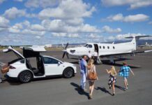 Free Flights from Honolulu to Lānaʻi with Four Seasons Resort Bookings Through 2026 a group of people walking towards an airplane