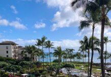 Hawai’i’s Michelin Key Hotels: A Complete Guide to the Islands’ Top Luxury Properties (2025) a resort with a pool and palm trees