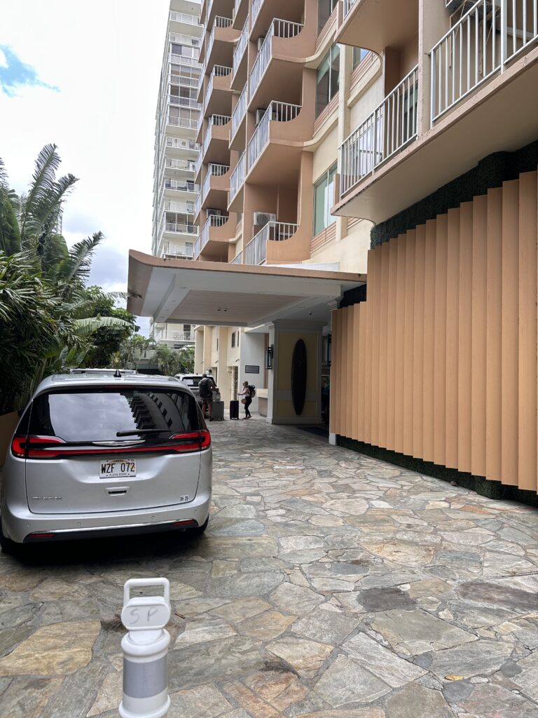 a car parked in front of a building