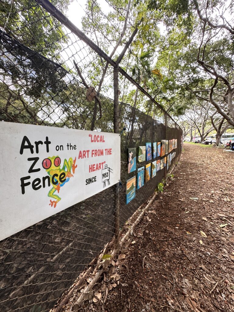 a fence with signs on it