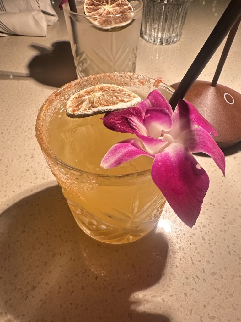 a drink with a flower on top