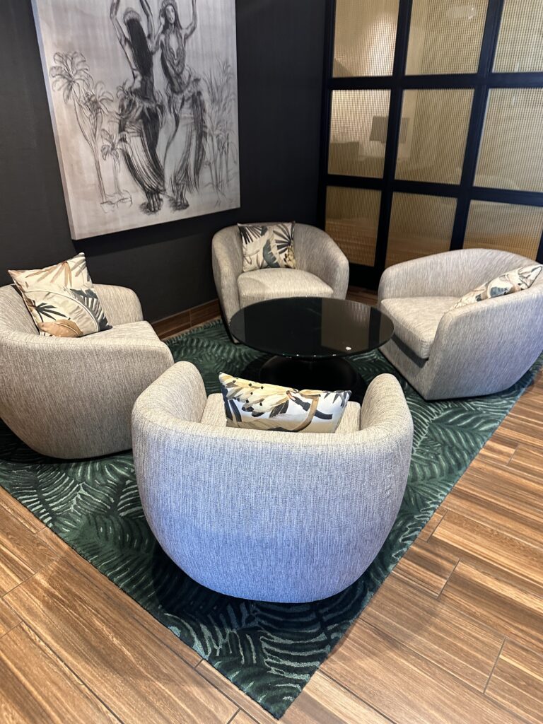 a room with chairs and a table