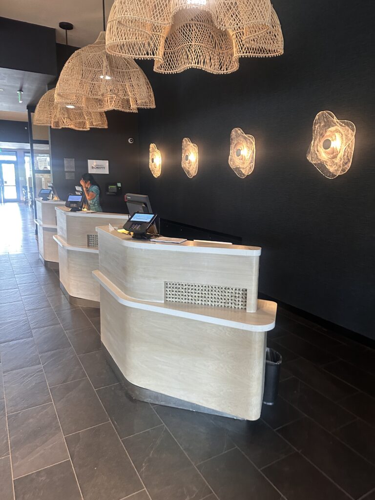 a reception desk in a hotel
