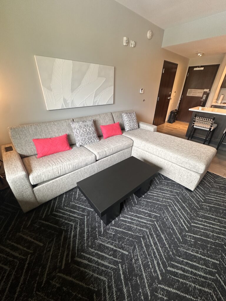 a living room with a couch and a coffee table