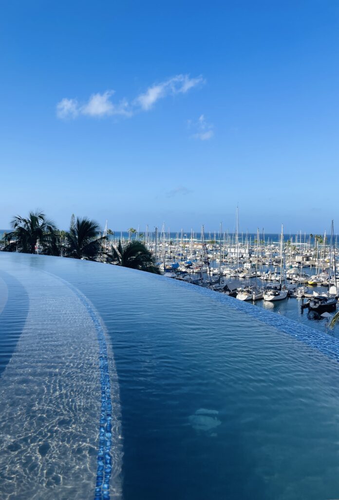 Where to Stay on O'ahu: Comparing Waikīkī, Ko Olina, and the North Shore Hawaii Calling a pool with boats in the water