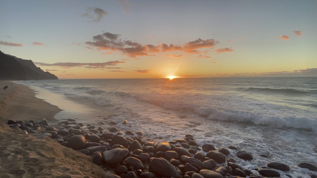 a sunset over a beach
