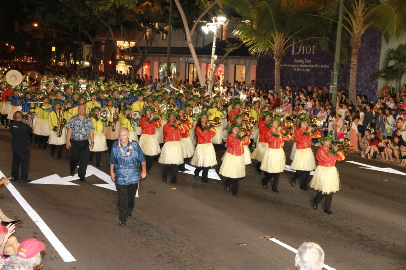 a group of people in hula dancing
