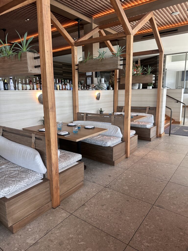 Review: The Ritz-Carlton O‘ahu, Turtle Bay — North Shore Luxury with Room to Breathe Hawaii Calling a restaurant with tables and chairs
