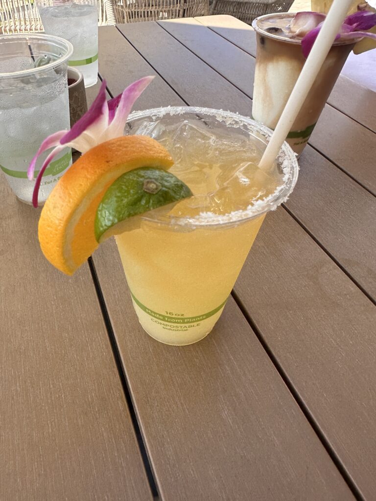 Review: The Ritz-Carlton O‘ahu, Turtle Bay — North Shore Luxury with Room to Breathe Hawaii Calling a drink with a slice of orange and a straw on a table