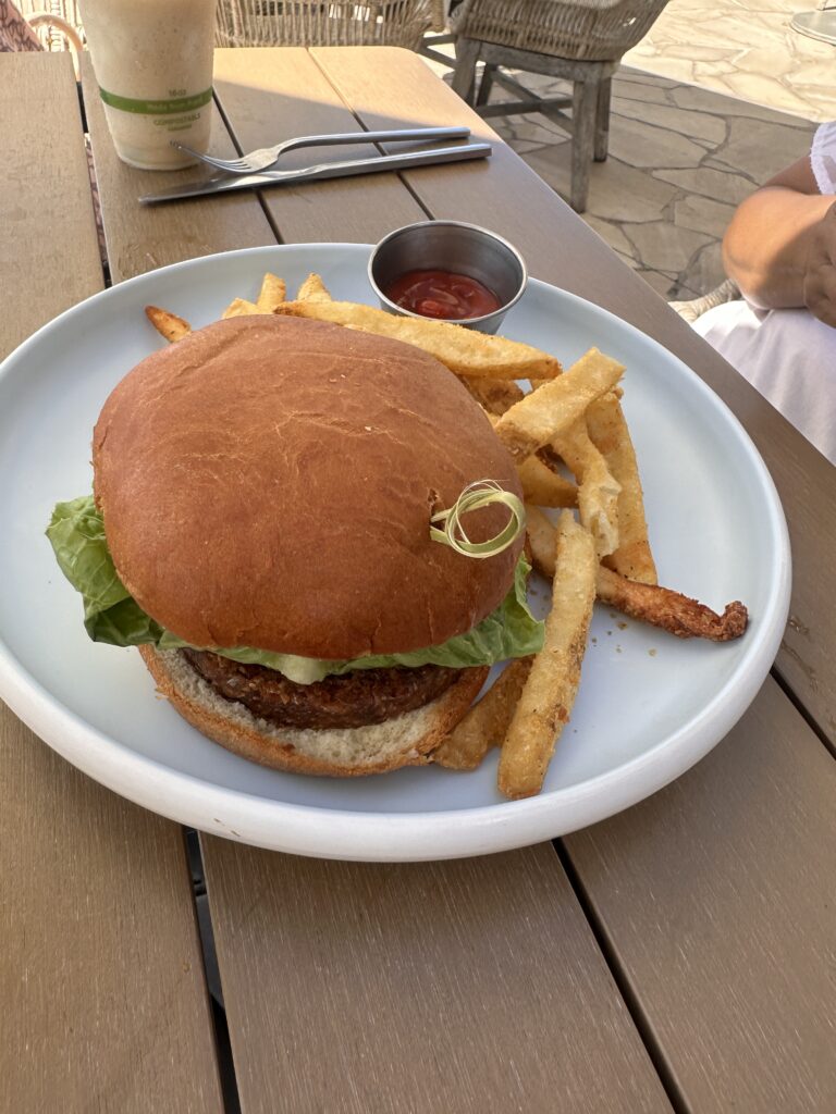 Review: The Ritz-Carlton O‘ahu, Turtle Bay — North Shore Luxury with Room to Breathe Hawaii Calling a burger and fries on a plate