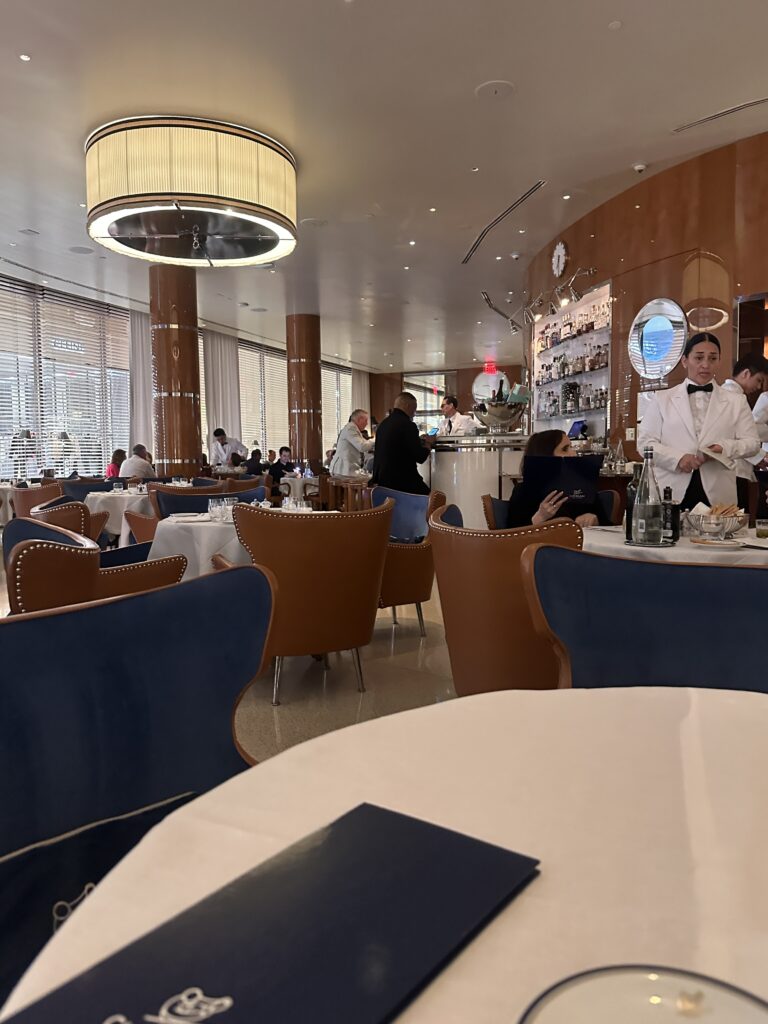 a restaurant with tables and chairs