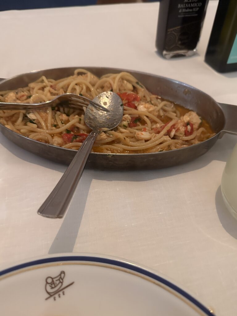 a pan of spaghetti with a fork