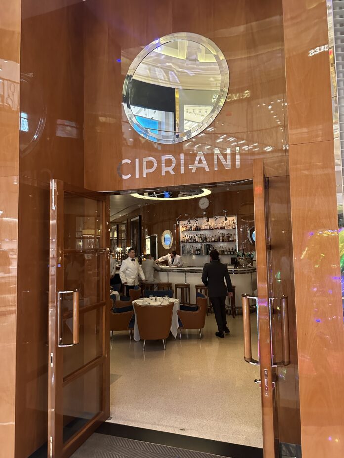 a restaurant with a sign on the wall