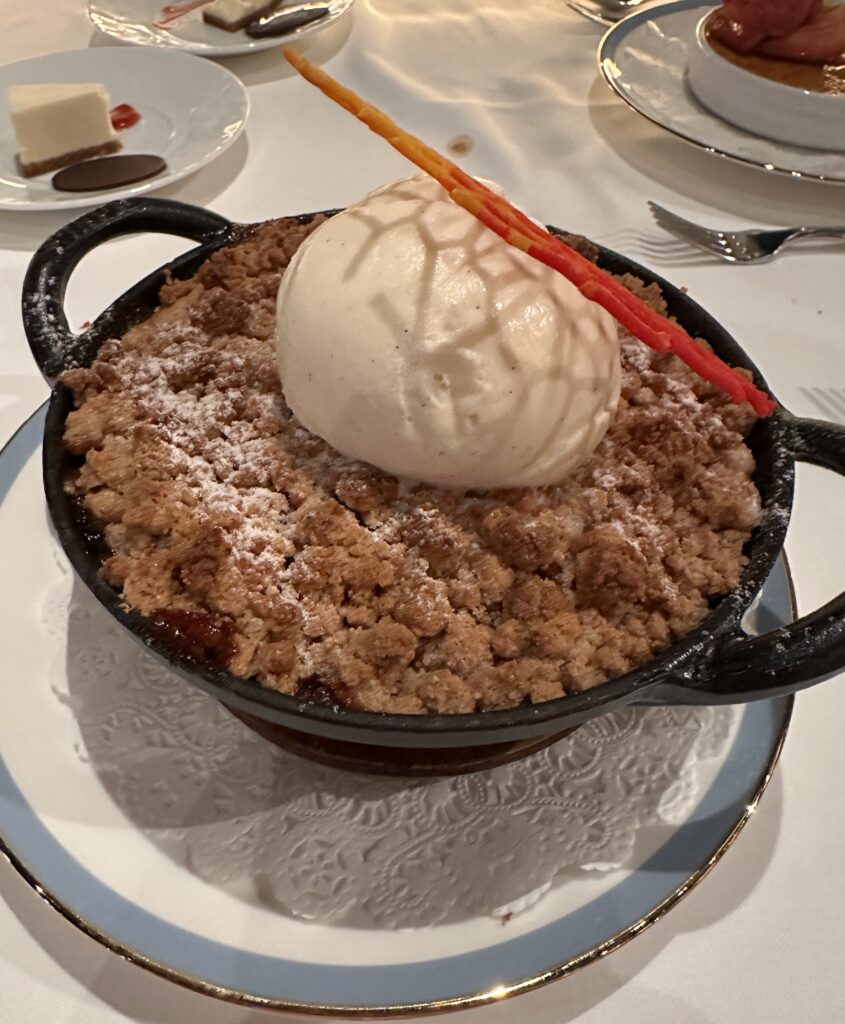 a bowl of dessert with a scoop of ice cream on top
